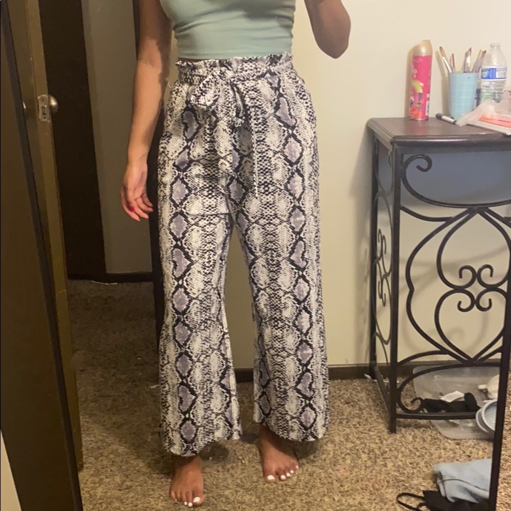 Snakeskin print trousers